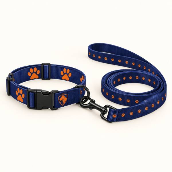 Navy Elite Professional Dog Training collar and leash set with orange paw prints and shield badge, black hardware